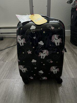 Kid's size suitcase on wheels