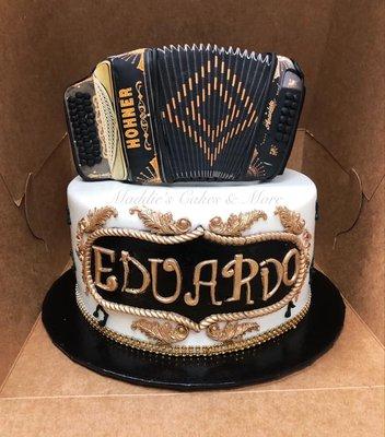 Accordion Theme Cake made with buttercream frosting and fondant details