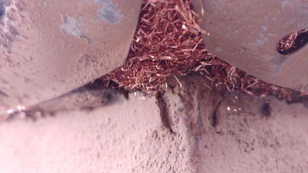 Copper mesh for a large void before sealing during a home seal