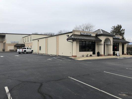 Side view of the Fivepointville Showroom.  The Flooring Outlet is located at the rear of the building.