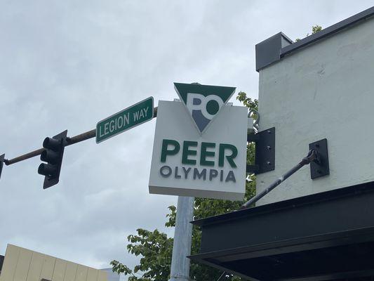 Peer Olympia's sign.