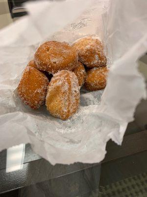 Delicious donuts lightly dusted in powder sugar.