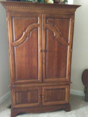 TV cabinet or can be used for storage. Shelves on bottom.  One piece. Well made.