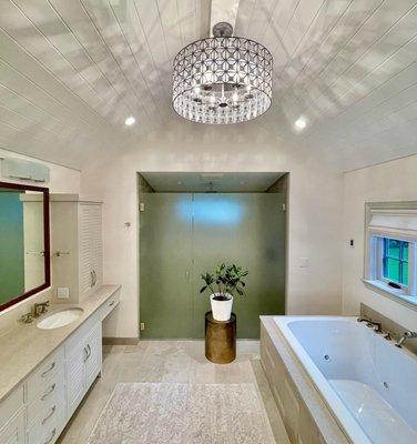 Updated this Raliegh Hills bathroom with vaulted celings, a soaking tub, curbless shower and see-thru fireplace. A fun project!