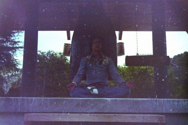 Meditating at the temple bell in 1977. We were there to meditate, train, and present a martial arts demo during Buddhas birthday.