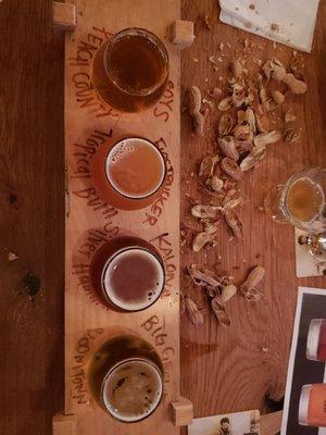 Beer flight and peanut shells