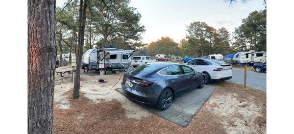 Charged up both of our Tesla's here.  But only one can stay overnight on the campground - one of them have to go to the parking lot.