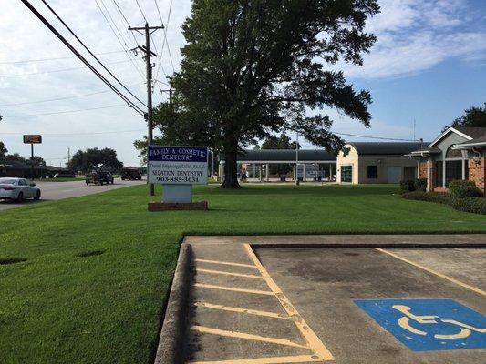 The office is across from Sonic and next to Alliance bank