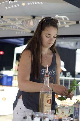 Tito's Vodka giving out free samples.