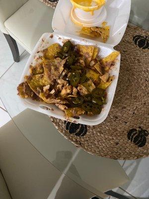 This is what the nachos looked like when I opened it. Completely old, and looks just thrown on