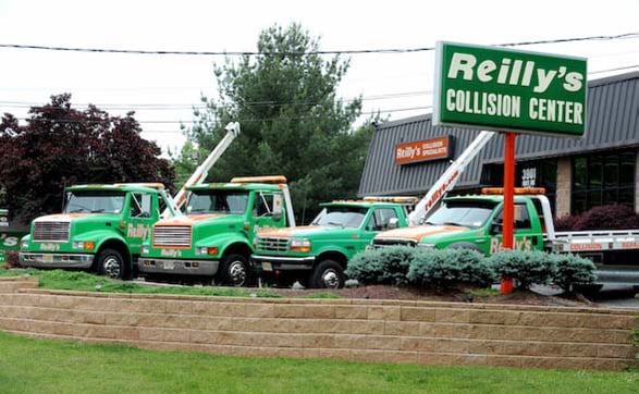 Reilly's fleet of tow trucks and car carriers are locally recognized with their Kelly Green, White and Orange colors.