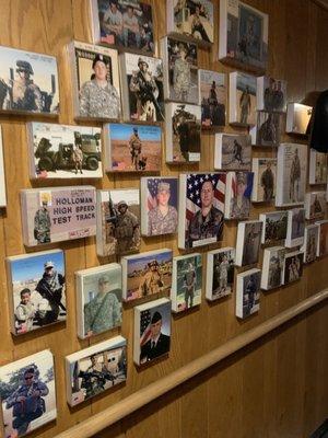 Picture wall of some of the veterans from the area