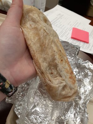 This was the quesadilla delivered.... more like a burrito that got into a fight...