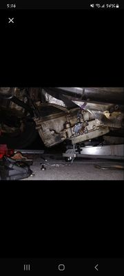 AO4ED auto trans being removed to repair heavy oil leak from rear main seal