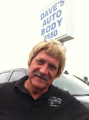 Smiling Ed Francis, owner of Dave's Auto Body at 3550 North Lake Blvd, Lake Park, FL. Great service and great work.