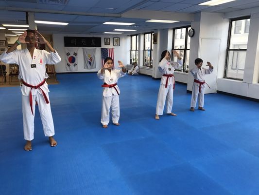 High red belts practicing Koryo for their Black Belt test