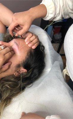 Threading brows