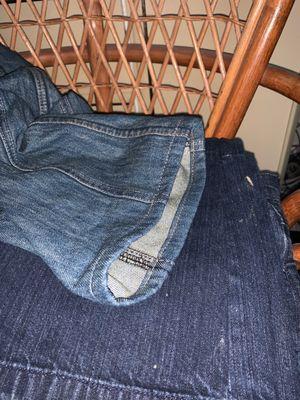 Motorcycle jean legs hemmed. Looks just like original.