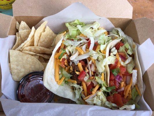 Three Tacos in a box with chips and salsa for a good price. Simple and fresh.