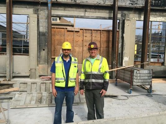 L Williamson with Construction Superintendent at a Denny Park Mixed-Use Building Site