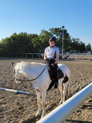 My daughter and Leroy, one of the school horses.