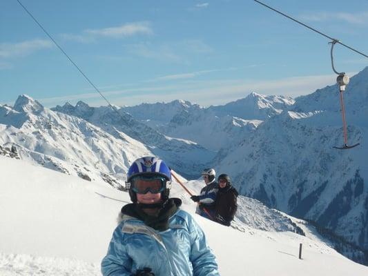 Dr. M's love for snow and mountains with his daughter in the foreground.