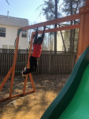 My 7 year olds having fun on the swing