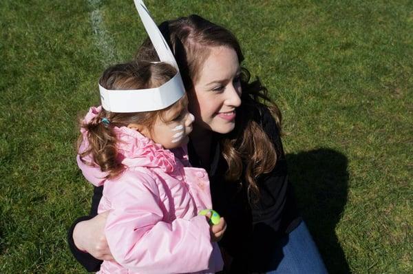 Ms. Jennifer with kids at the Easter Egg Hunt