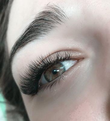 Let your eyes speak volumes with our captivating eyelash extensions.