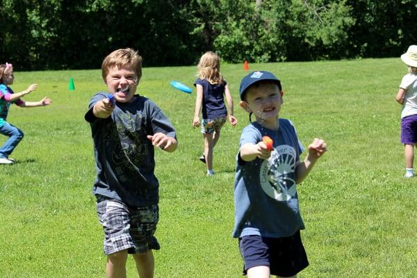 Squirt gun attack at camp!