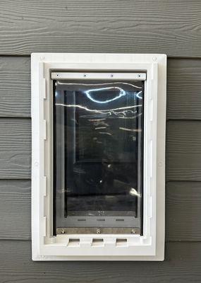 Dog door installation.