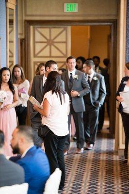 Monica in action she is the boss! getting everyone ready and in place. Photography: truephotographyweddings