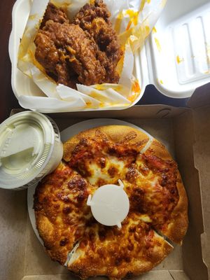 Person Cheese pizza and Buffalo Wings