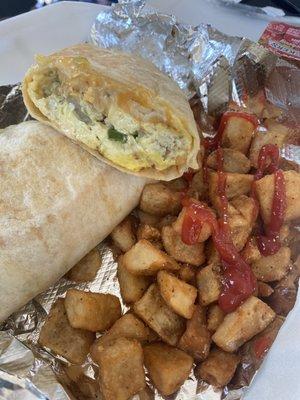 Breakfast burrito and home fries.