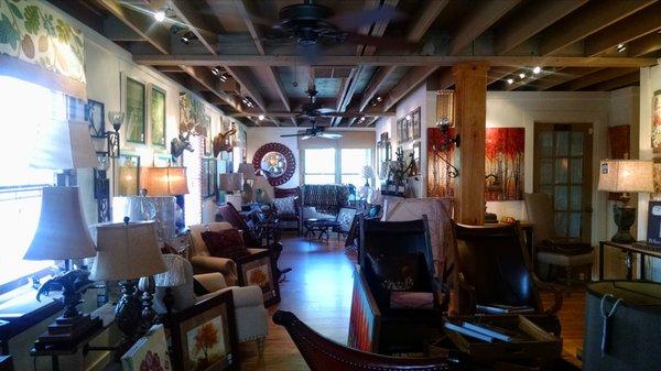 This is the second level that features more furniture and general decor.  Check out the ceiling beam and floor.  Such a cool space!