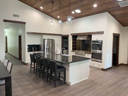 Remodeled kitchen with island and pantry