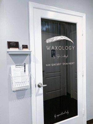 Waxology Suite, first door at the top of stairs