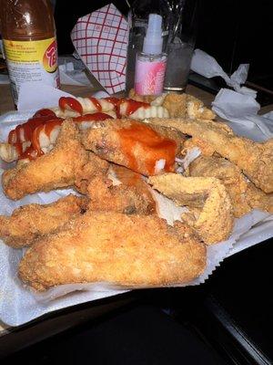 Fish and wings combo... not pretty, but served hot, fried and seasoned to perfection!