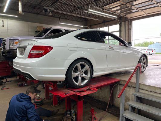 Rear wheels being aligned (Brandon)