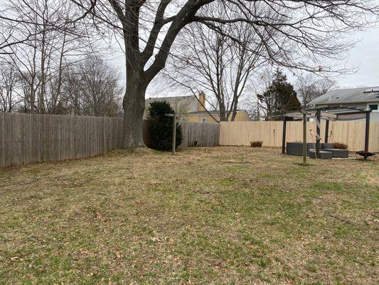 Fence installed a year ago and fresh fence meeting up. The color will match after a bit of weather hits it.