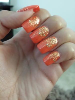 Coral nails with glitter ombre