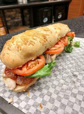 The Rachette Sandwich. Jalapeno Cheddar Bread, Chicken, bacon, provolone cheese, BBQ sauce, lettuce and tomatoes.