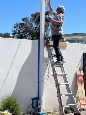 Installing Axis Cameras on custom camera poles.