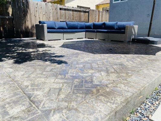 Stamped cement raised patio pad