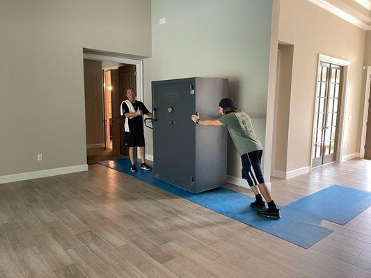 We move heavy gun safes and at the same time protect the floor with heavy duty mats and wood.