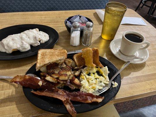 Excellent breakfast made as per my request- well done fried potatoes! Eggs, bacon, biscuits & gravy with coffee in a cup & saucer.