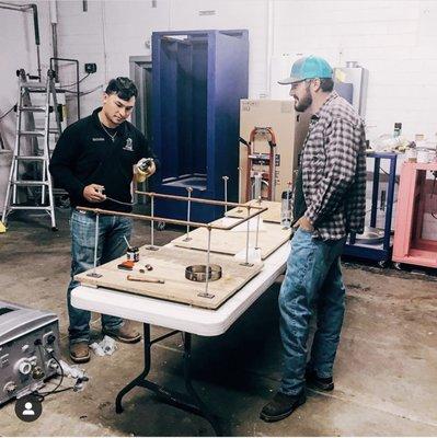 Apprentice training at the shop