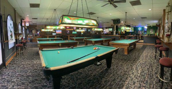 Good layout and custom stained glass lighting over tables.