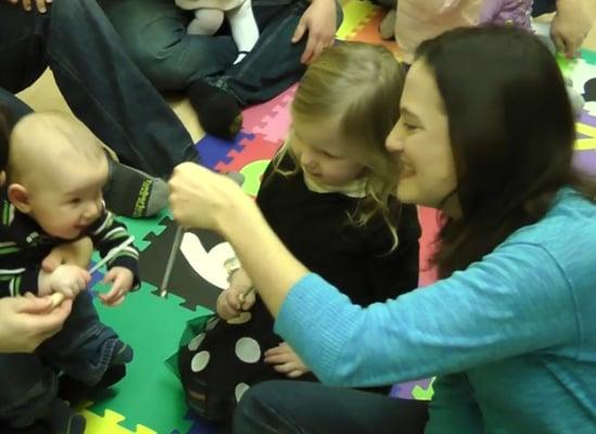 Never too young to play the triangle.