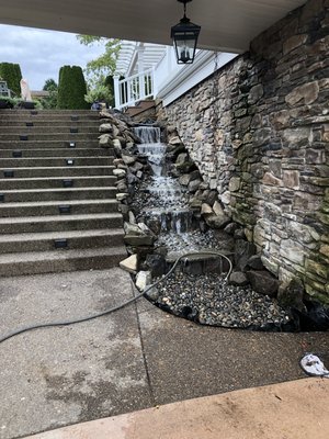 Put in an waterproofed outdoor waterfall